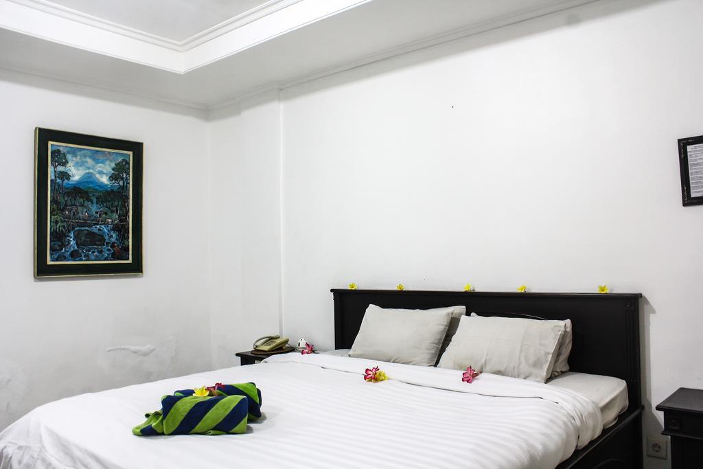 Hotel Puri Tanah Lot 庫塔 外观 照片