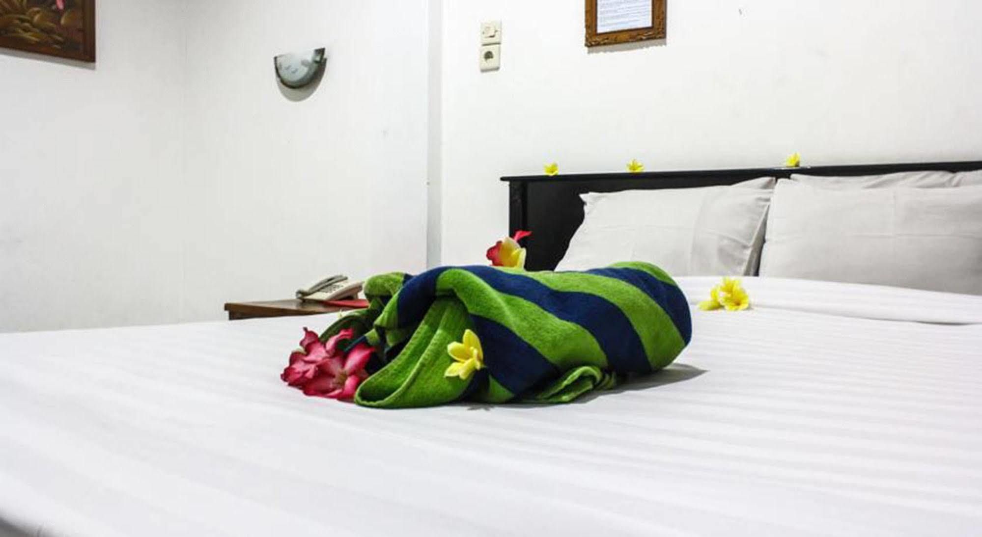 Hotel Puri Tanah Lot 庫塔 外观 照片