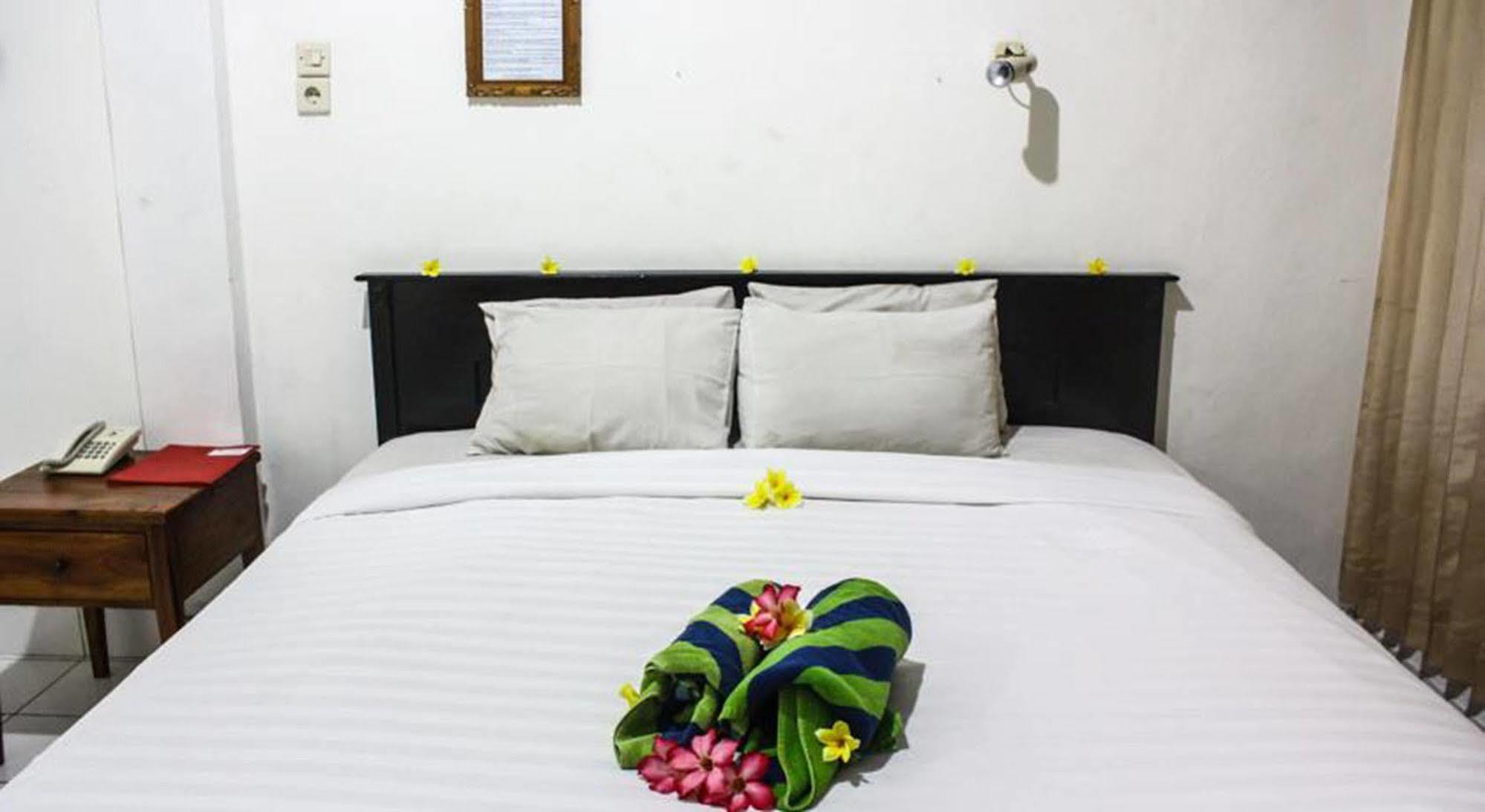 Hotel Puri Tanah Lot 庫塔 外观 照片